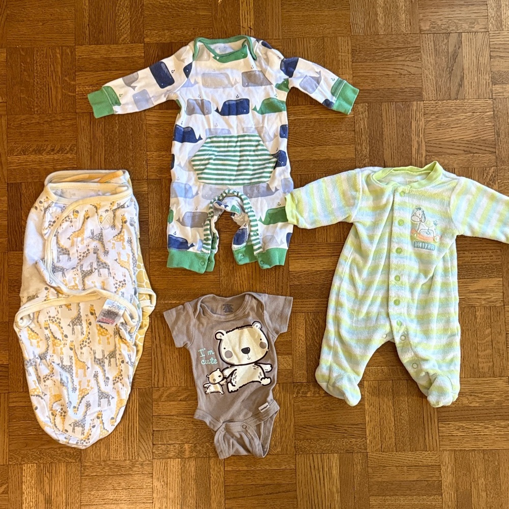 Bundle of three swaddles and three newborn outfits